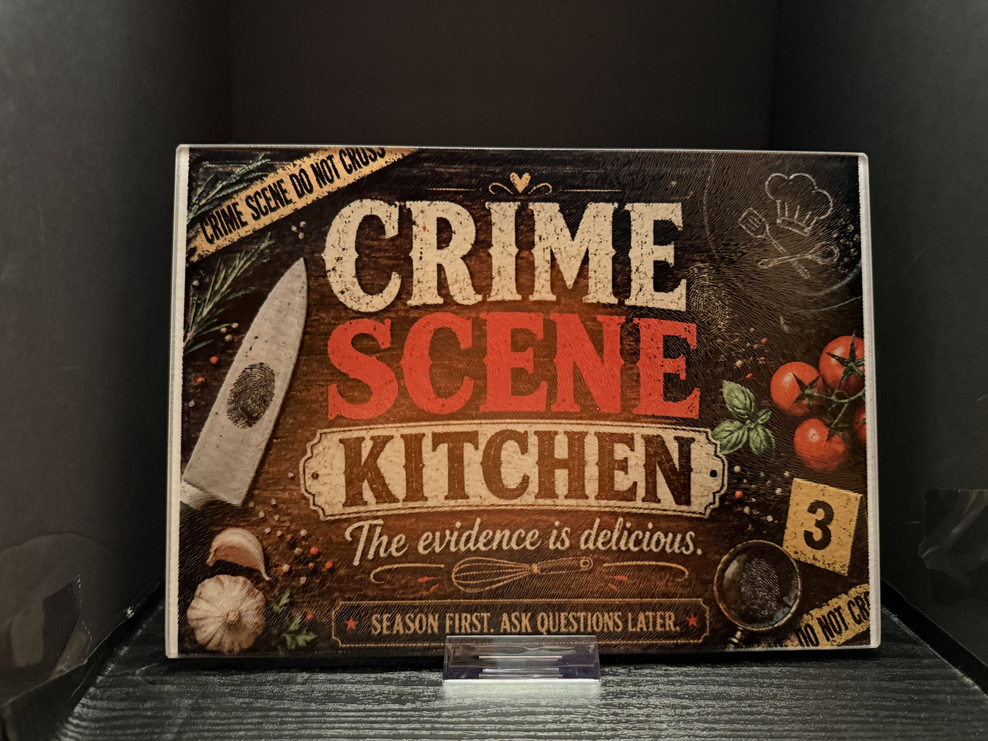Crime Scene Kitchen. The Evidence Is Delicious. Season First. Ask Questions Later. - 11"x7.87" Glass Cutting Board