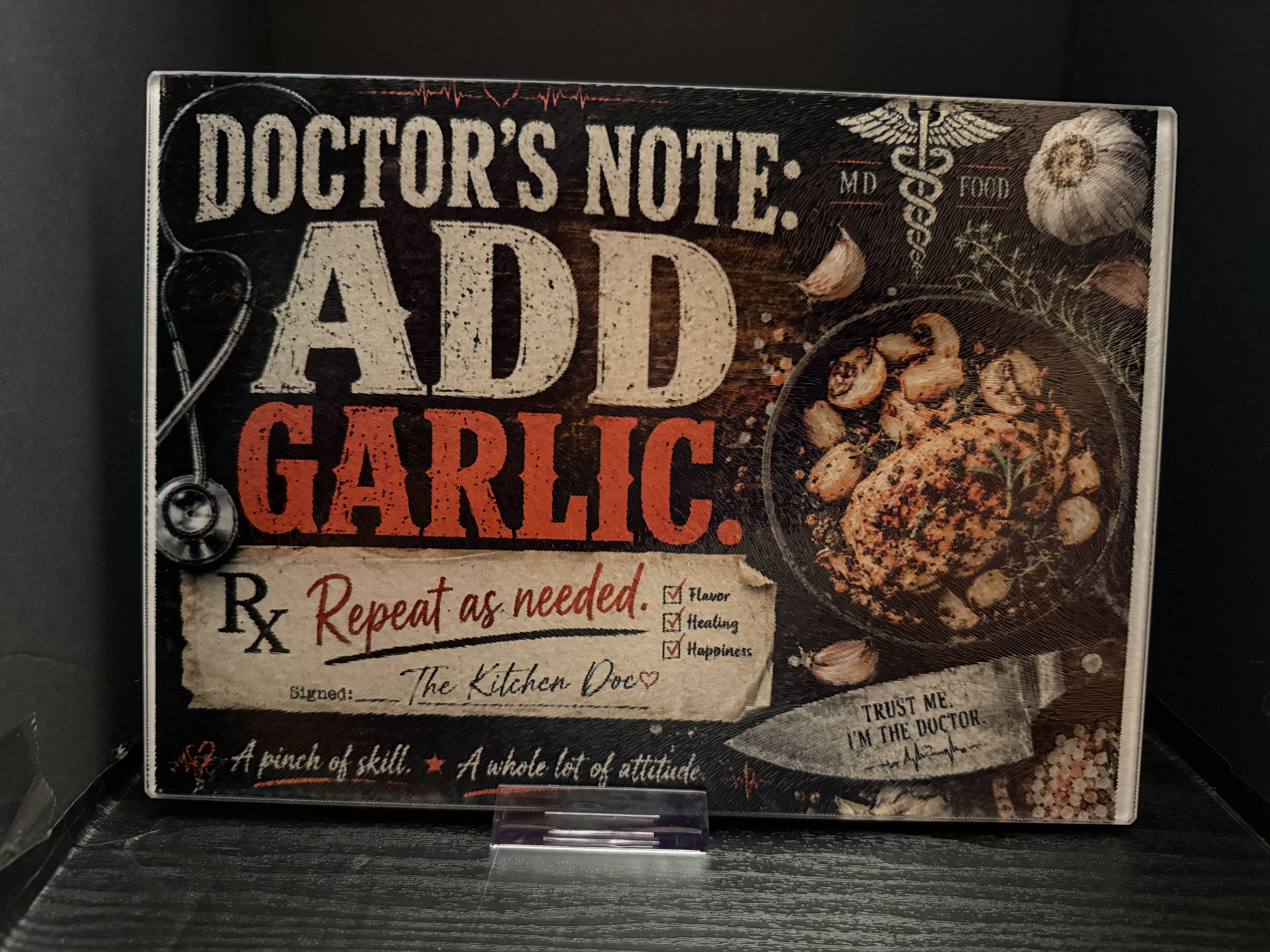 Doctor's Note: Add Garlic. Repeat as Needed. A Pinch of Skill. A Whole Lot of Attitude. - 11"x7.87" Glass Cutting Board