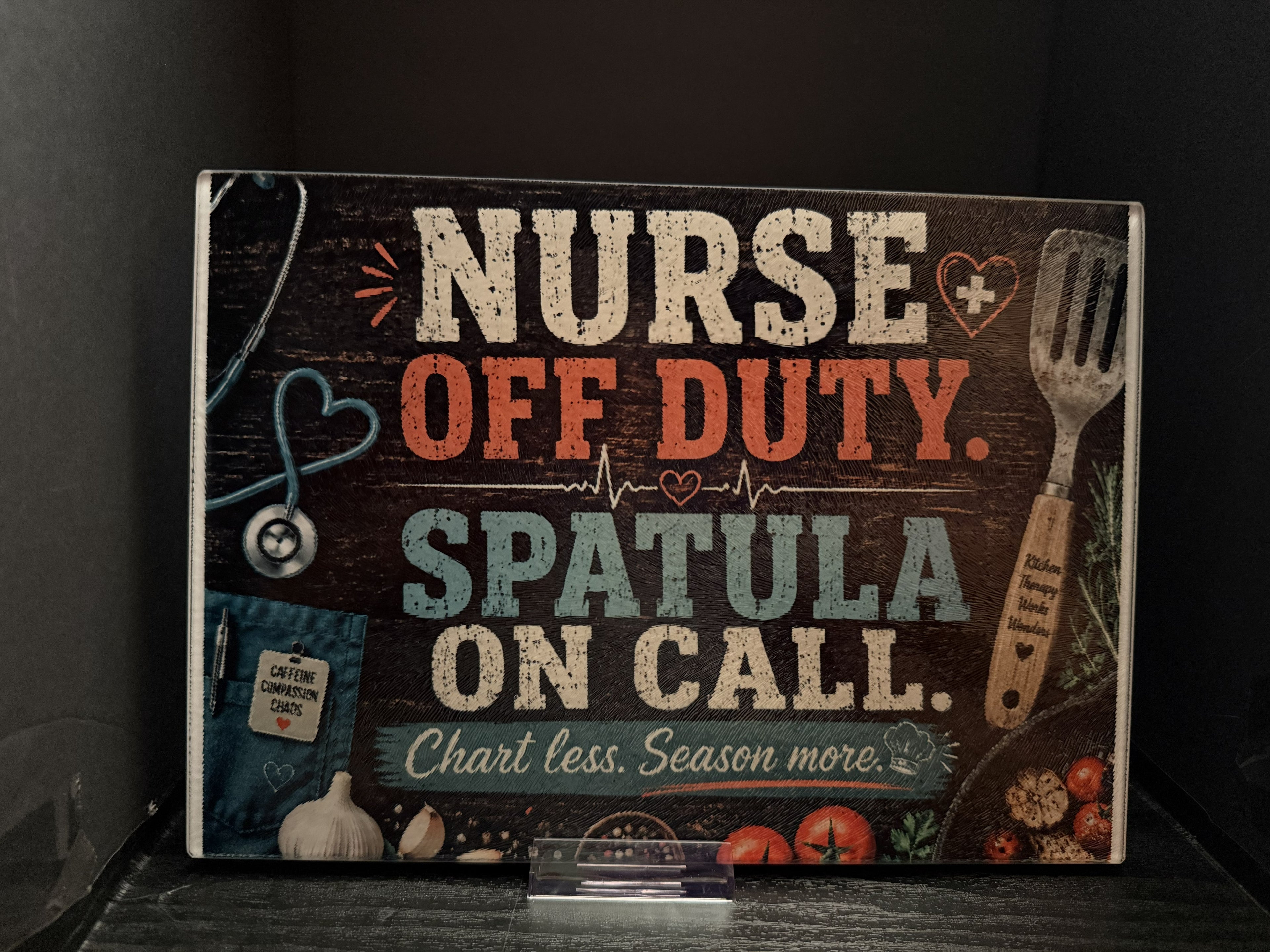 Nurse Off Duty. Spatula on Call. Chart Less. Season More. - 11"x7.87" Glass Cutting Board